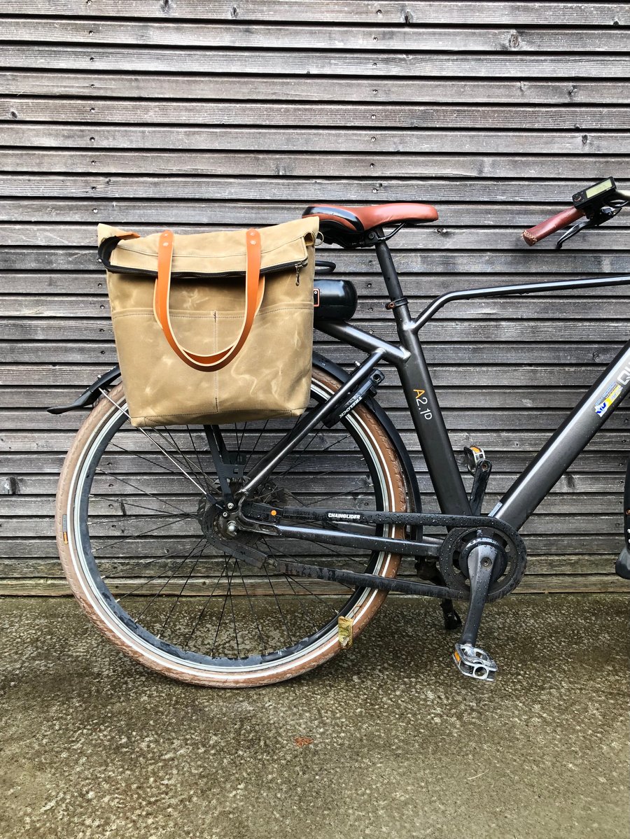 Image of Diaper bag convertible into bicycle bag in waxed canvas with shoulder strap