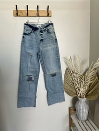 Little Luxe Boutique Ripped Jeans 
