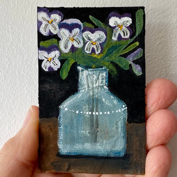 Image of purple and white violas in a bottle - tiny painting 