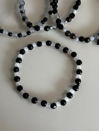 Image 9 of Black, White and Silver Skull Tumbler Bracelet Stack