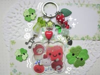 Image 3 of resin clover keychains.𖥔 ݁ ˖𓂃.☘︎ ݁