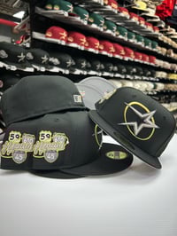 Image 1 of New Era 59Fifty Black White Gold Oval Star Slab City