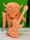 Skullion peach vinyl figure