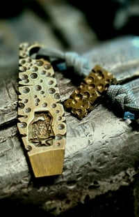 Brass DeathPRY and matching bead