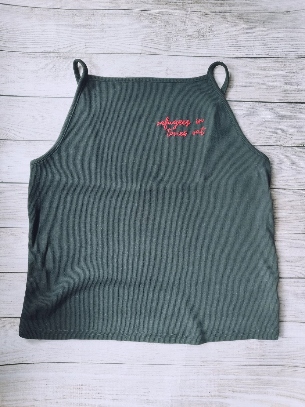 Image of refugee solidarity tops