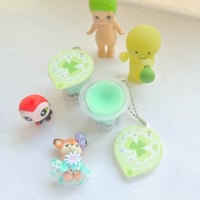 Image 3 of ocean & clover pudding ₊˚♪ 𝄞  squishy jelly keychains!! 🐟☘️