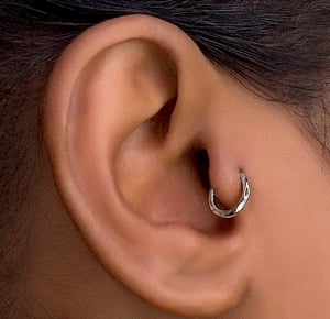 TRAGUS PIERCING SERVICES