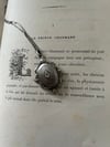 Pendentif en argent massif ouvrant porte-mèche ou porte-photo, fin du XIXème siècle
