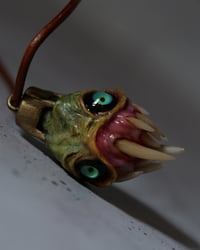Image 10 of Egg of the King all seeing fangs pendant, leather cord, brass hardware, OOAK