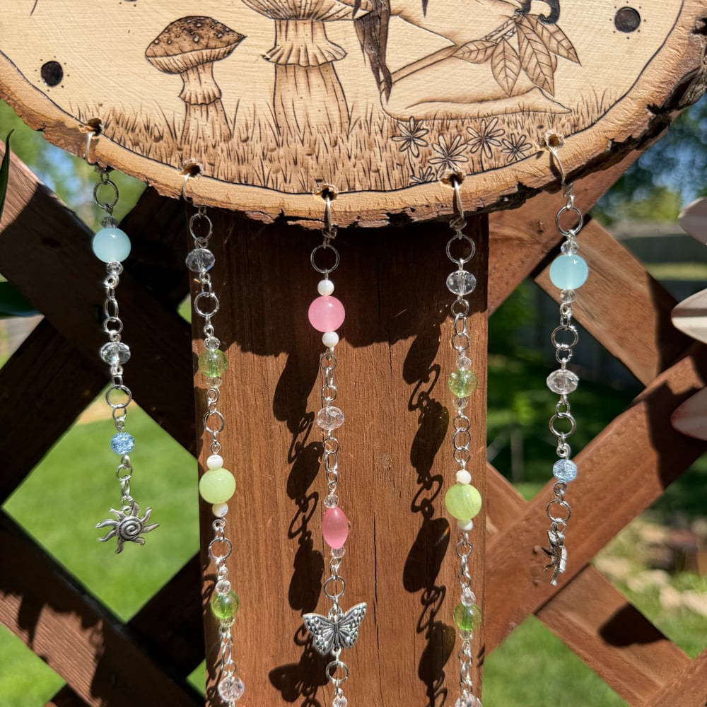 Image of sun fairy hanging beaded wood art 