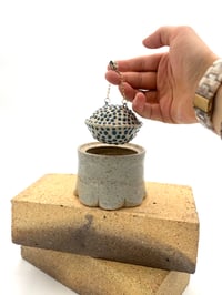 Image 1 of blue chain handle jar