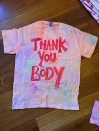 Image 2 of Rainbow Tie Dye T Shirt with pinky orange text (medium)