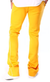 Image 3 of Stacked Track Pants Yellow 