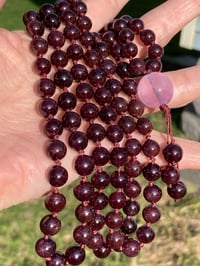 Image 4 of Asterism Garnet Mala with Gem kunzite Guru Bead, Asterism Garnet 108 Bead Hand Knotted Gemstone Mala