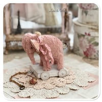 Image 1 of Handmade standing elephant on a vintage style wooden cart