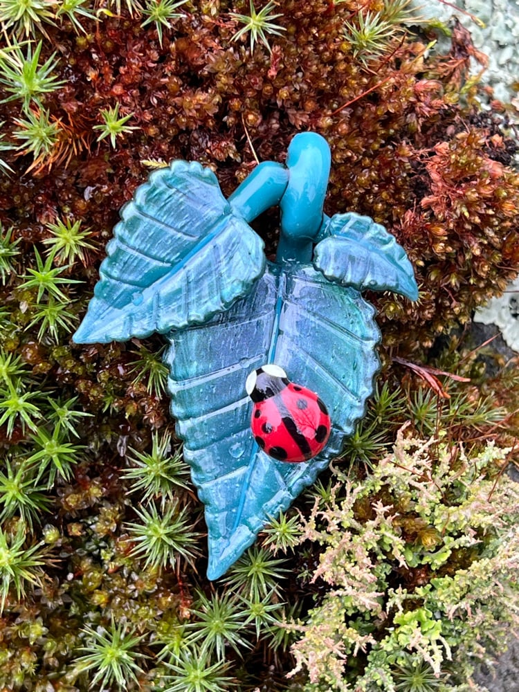 Image of Liquid Blue Triple Leaf & Ladybug Pendant