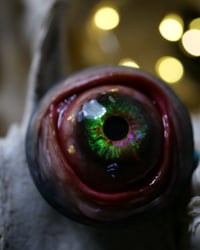 Image 13 of Custom Swappable Phone Grip for smartphones, reflective pupil, green glow in the dark