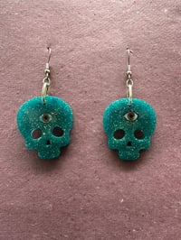 Image 1 of Green skull earrings 