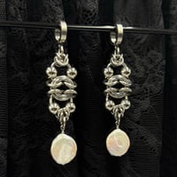 Image 4 of A Clam’s Vertebrae Earring