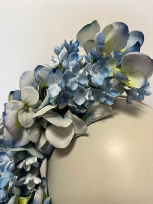 Image of Pale blue flower trail