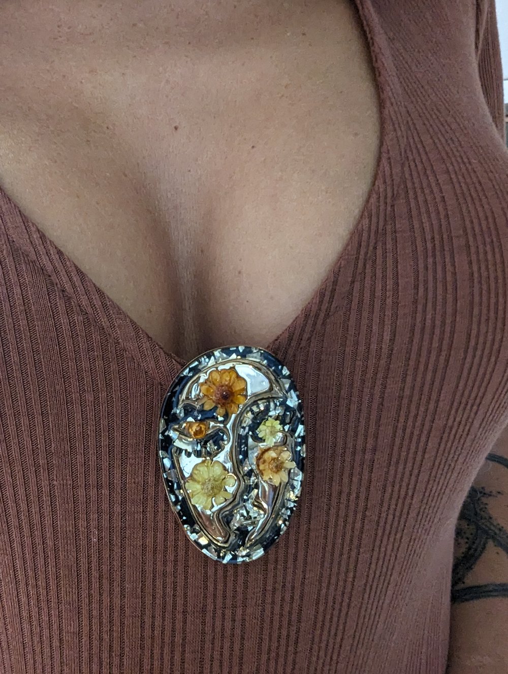La broche visage
