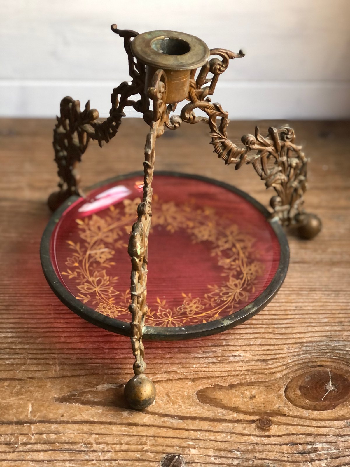 Image of Brass candlestick with cranberry glass 