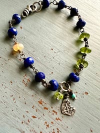 Image 19 of lapis and peridot charm bracelet