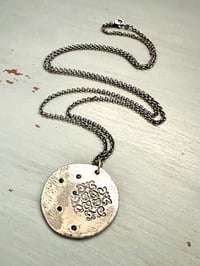 Image 10 of blue sapphire pendant with Fitzgerald quote