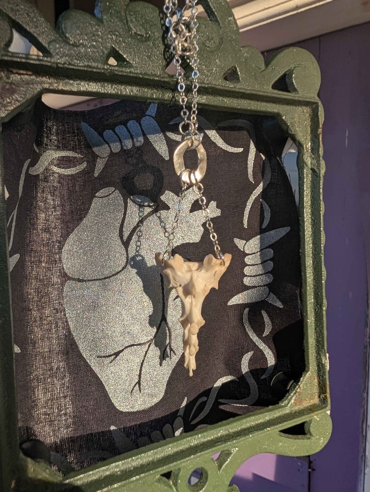 Image of rabbit tail necklace