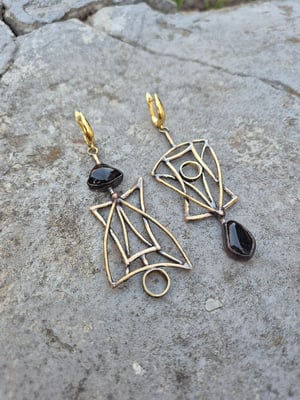 Asymmetrical brass earrings 