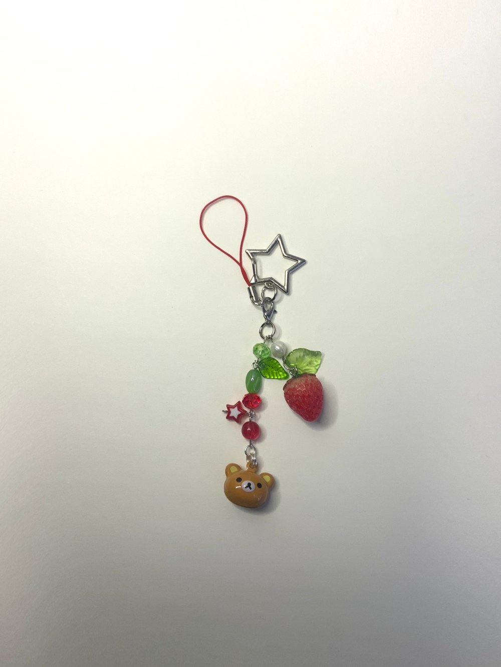 Image of Strawberry rilakkuma bell charms ⋆˚✿