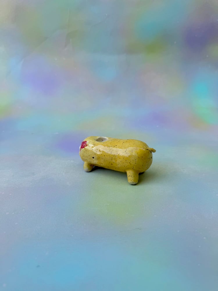 Image of optimistic puppy pipe