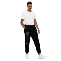 Image 1 of Black and Gold Celestial Inspired Geometric Print Unisex track pants