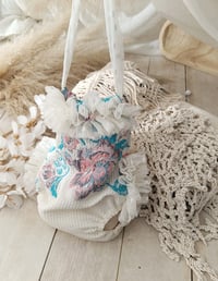 Image 1 of Photo prop | Sitter baby bodysuit | Marella | age 9-12 months | pink&turquoise flowers