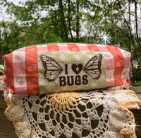 Image 1 of quilted bug pouch