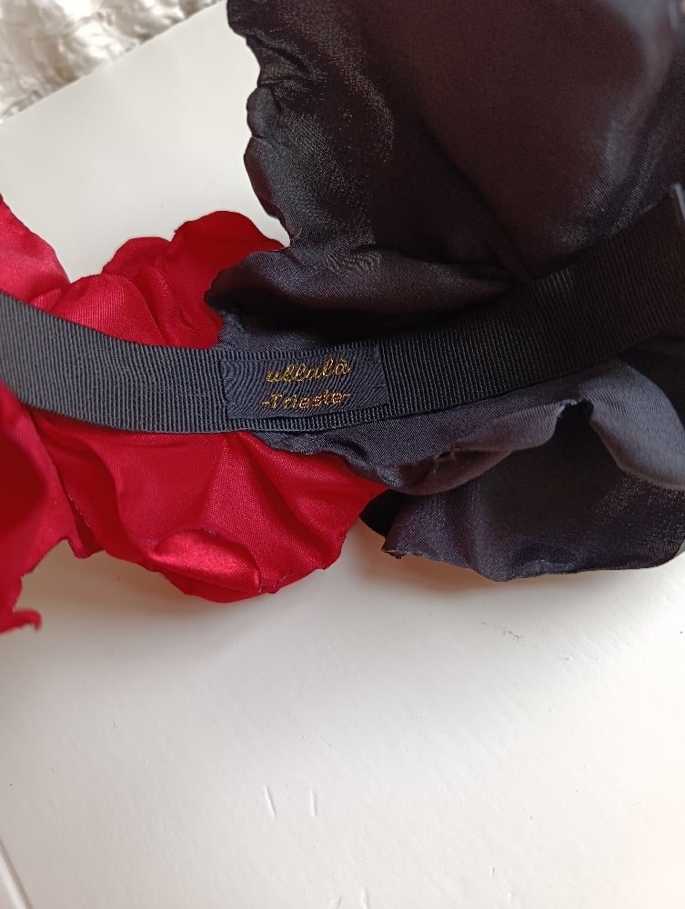 Image of Cerchietto floreale bicolore rosso/nero