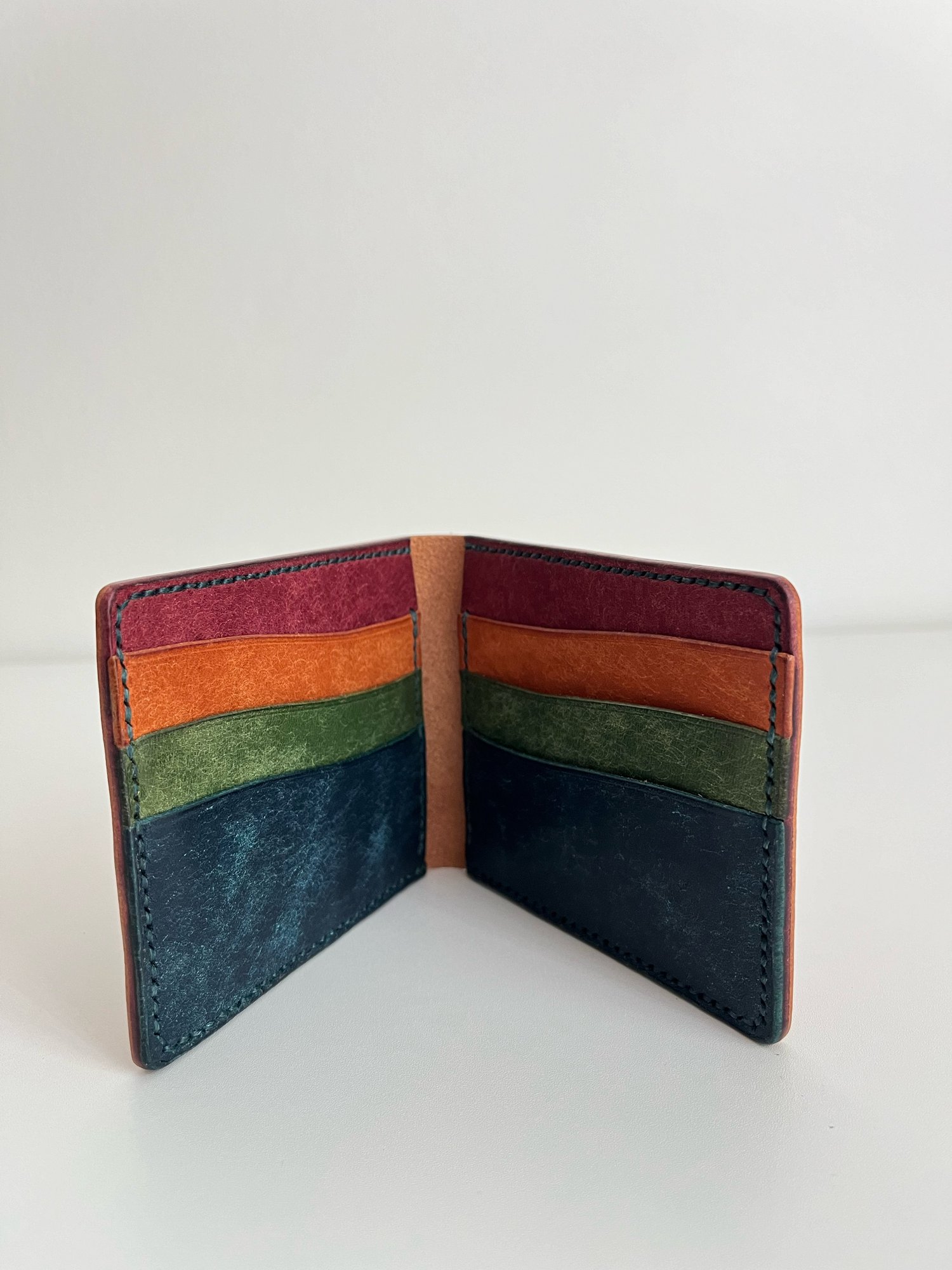 Image of Cognac/Rainbow Pueblo 8-pocket Slim Bifold 