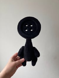 Image 1 of Black button folk Doll