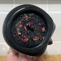 Image 2 of smoked pumpkin scented skull candle