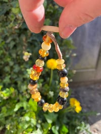 Image 2 of Amber and Jet mixed beads. 