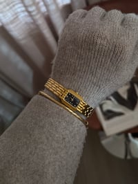 Image 1 of Vintage Pulsar By SEIKO Gold Tone Black Rectangular Dial 