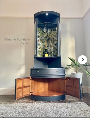 Image of Nathan Corner Drinks Cabinet unit with geometric lining.