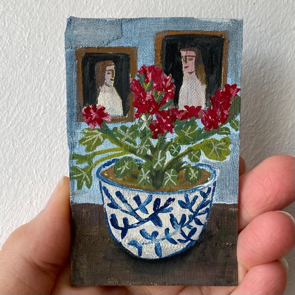 Image of pelargonium in a blue and white bowl