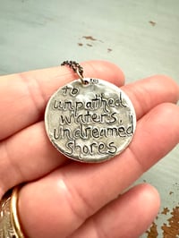 Image 15 of sapphire pendant with hand engraved Shakespeare quote