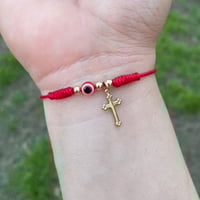 Image 1 of Evil eye with cross bracelet