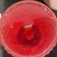 Image 4 of champagne pop scented pink glass candle