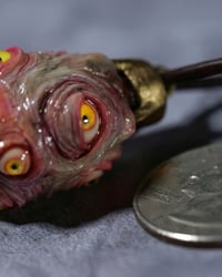 Image 9 of Egg of the King pendant, leather cord, brass hardware, all seeing glowing eyes