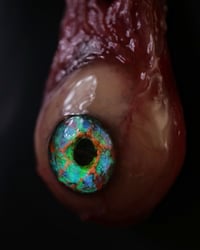 Image 4 of Optic Nerve-glow in the dark eye pendant with “eye shine” pupil