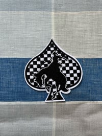Checkered ace iron on
