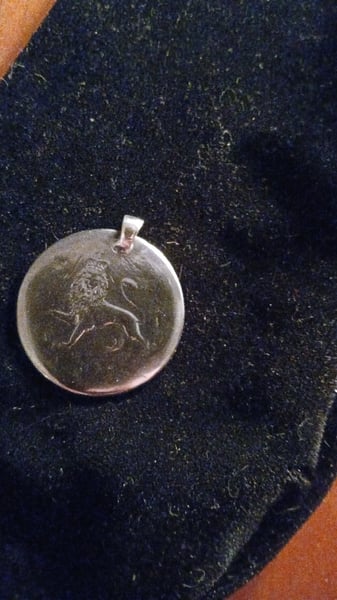 Image of Sterling silver lion pendant